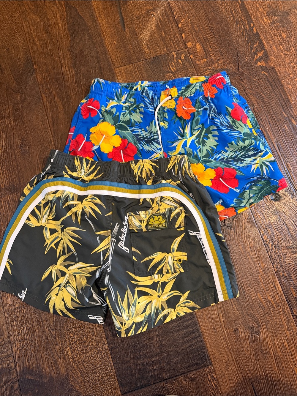 Sundek Kids Floral Swim Trunks in Blue, Red, Yellow and Black